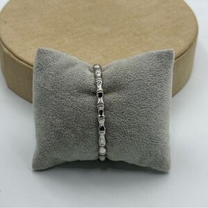 Elegant Silver tone bone design Bracelet